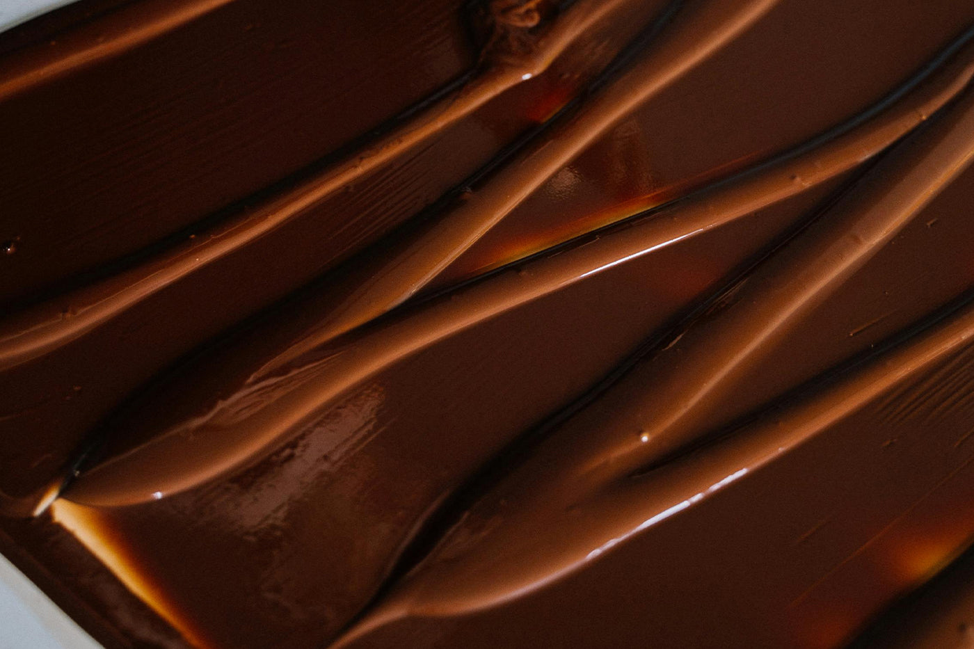 Smooth chocolate hazelnut spread swirl, the indulgent base of Syren beauty chocolate.