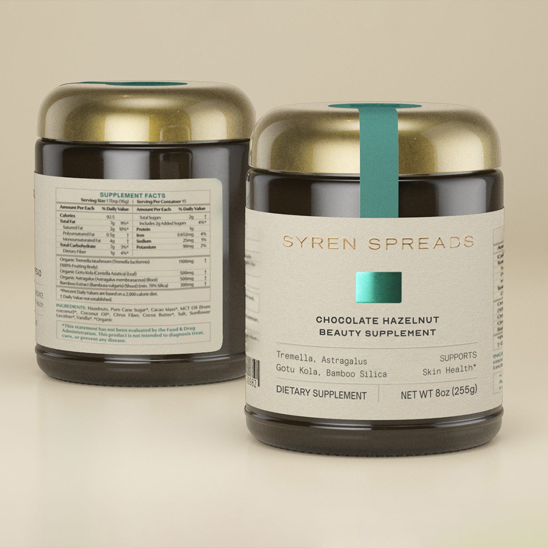 Syren Spreads Chocolate Hazelnut Beauty Supplement, 8oz (255g) dietary supplement jar with a gold lid and teal security seal on a neutral background.